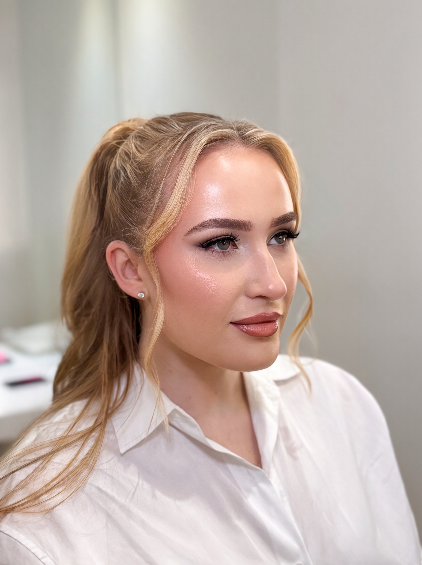 Glowing soft glam makeup with feathered brows